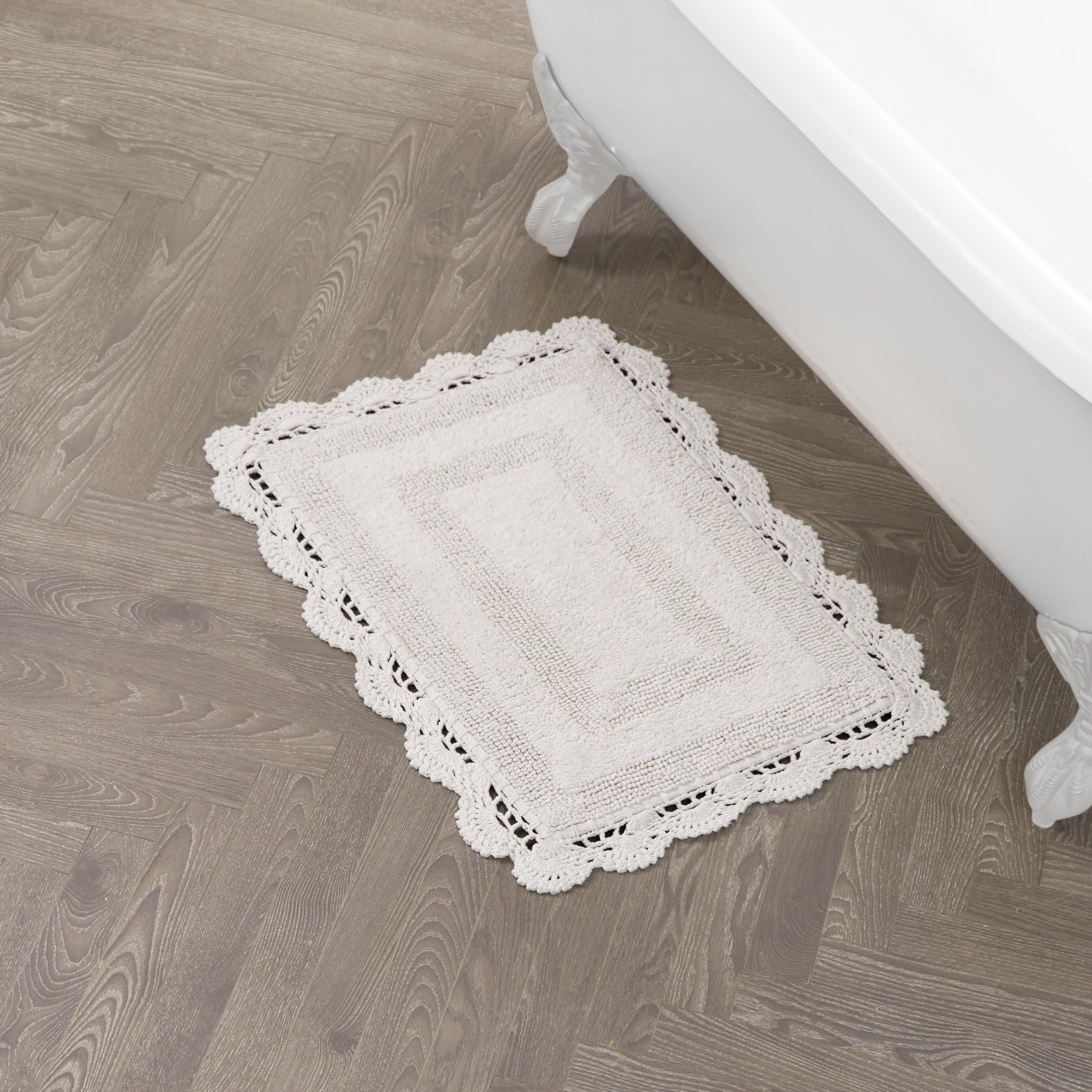 改Laura Ashley Crochet Cotton 17x24/21x34 in. 2-Piece Bath Rug Set, Creamy White