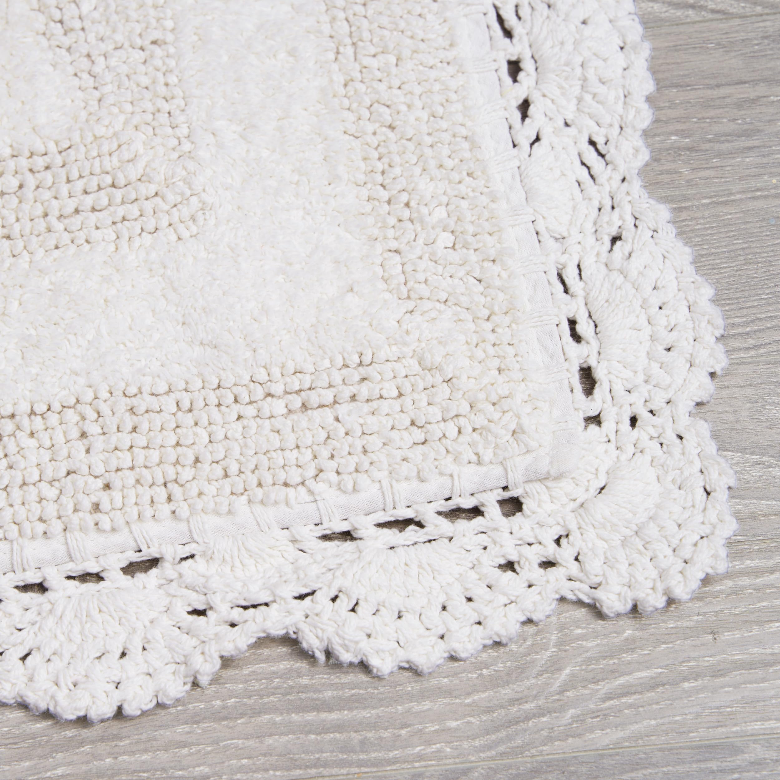 改Laura Ashley Crochet Cotton 17x24/21x34 in. 2-Piece Bath Rug Set, Creamy White