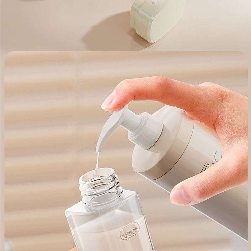 2Pcs package 4-in-one Travel Portable Dispenser Bottle(Color Random)